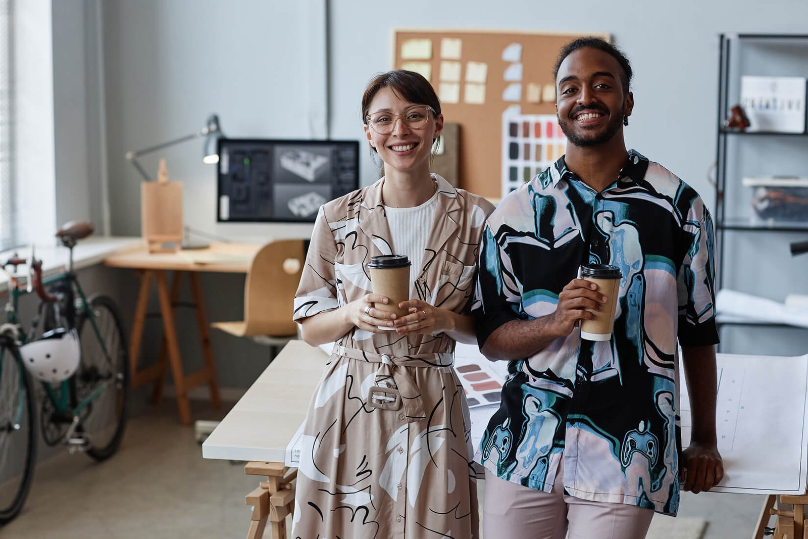 coworkers looking at camera and holding coffee 2026 01 08 07 30 17 utc 1.jpg